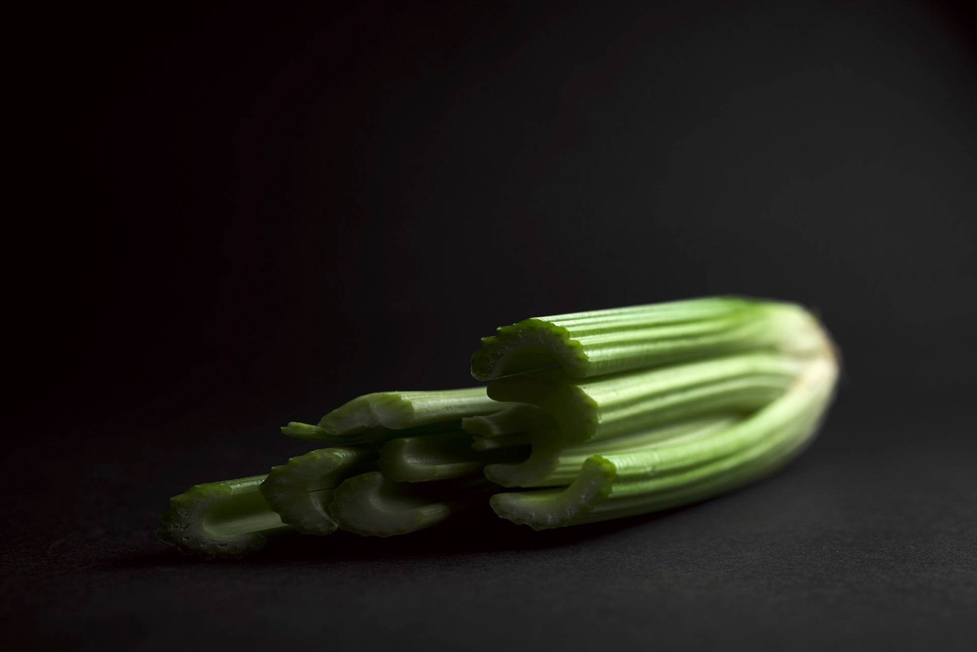 celery on black background