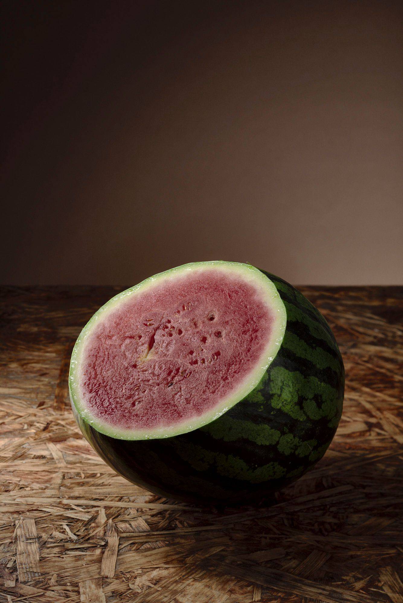 watermelon with brown wooden background