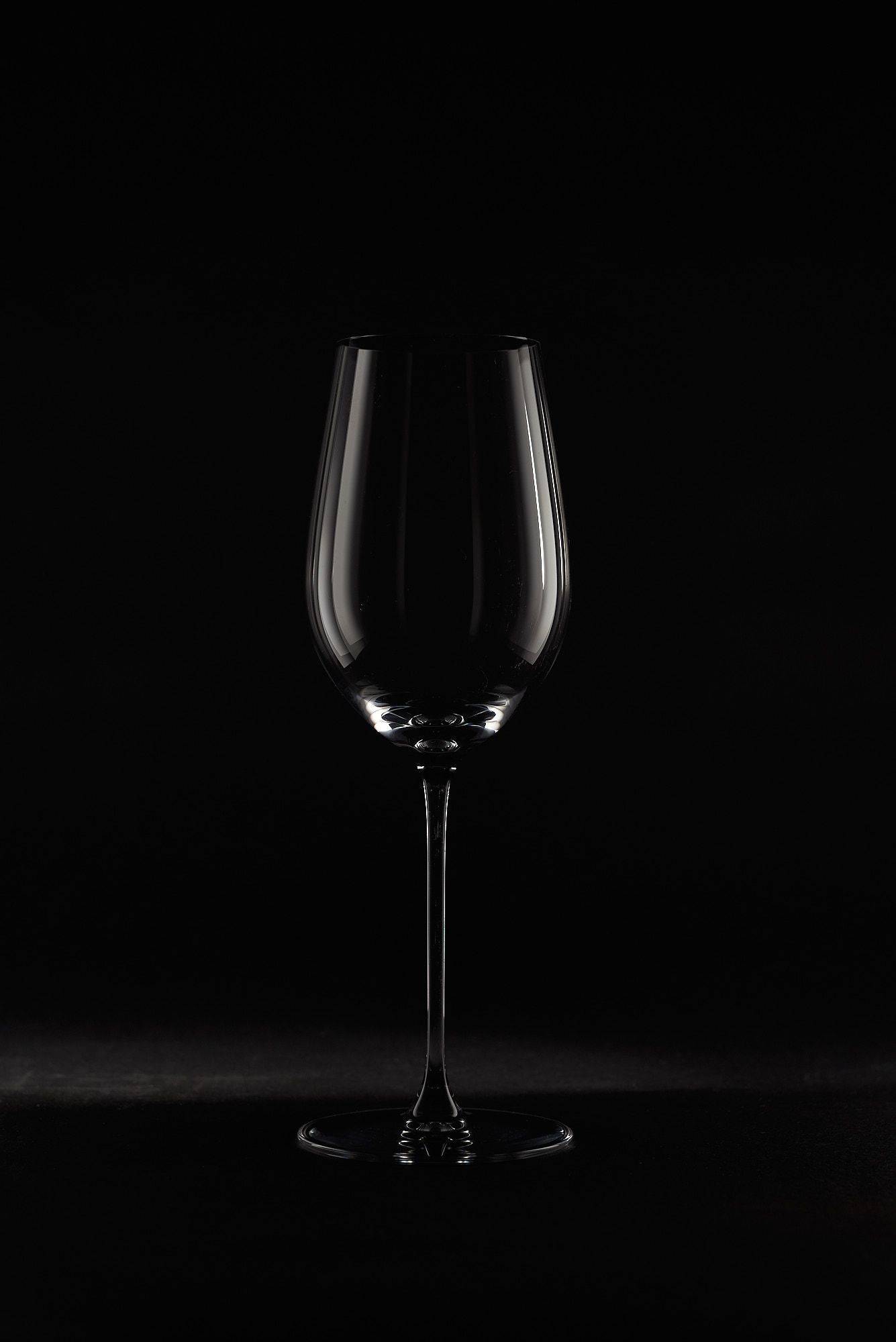 riedel veritas riesling and zinfandel wine glass on black background