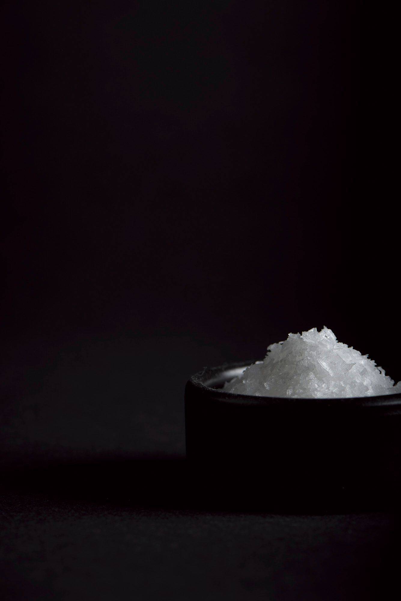 sea salt on black background