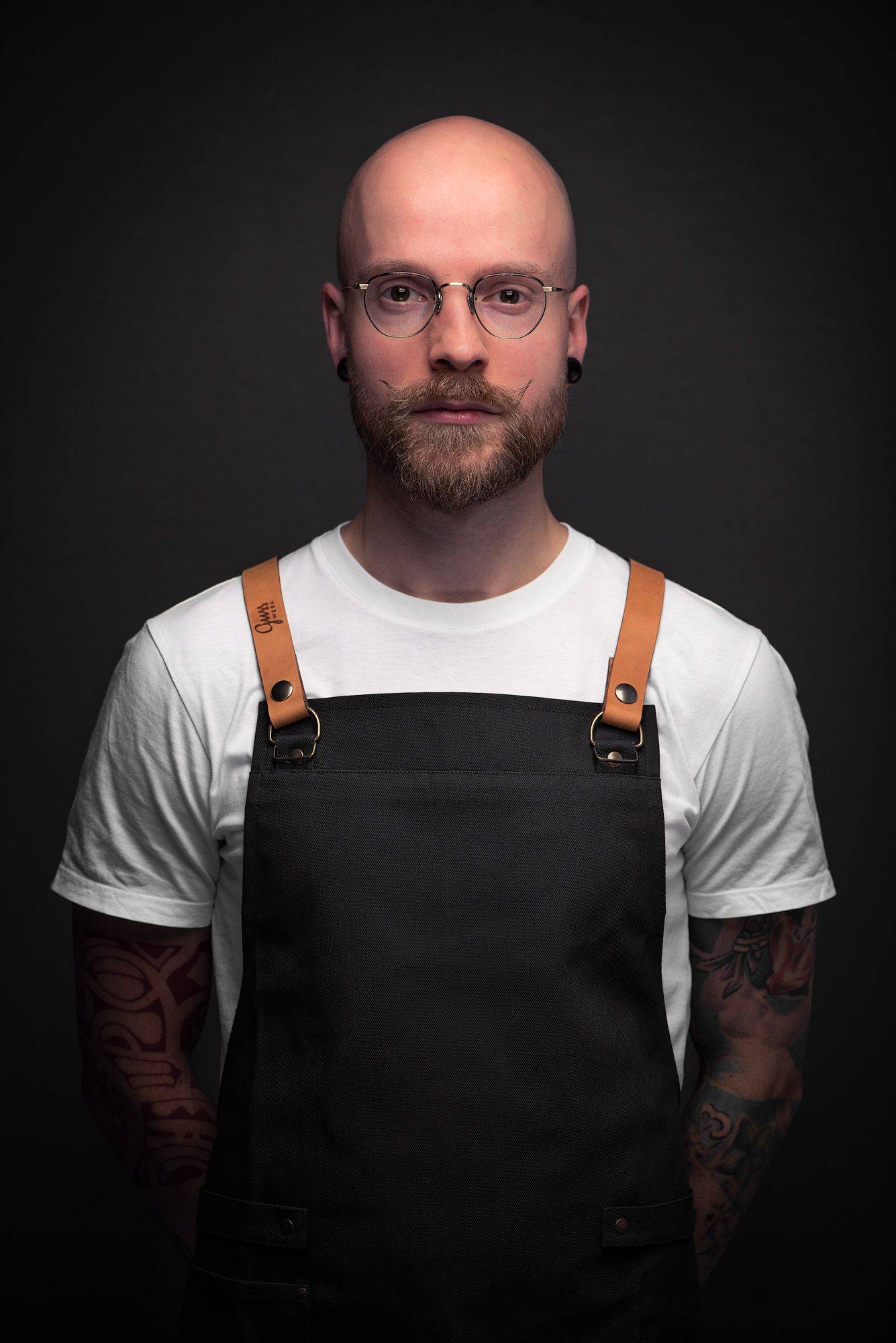 Ben Donath wearing a gusswerk apron