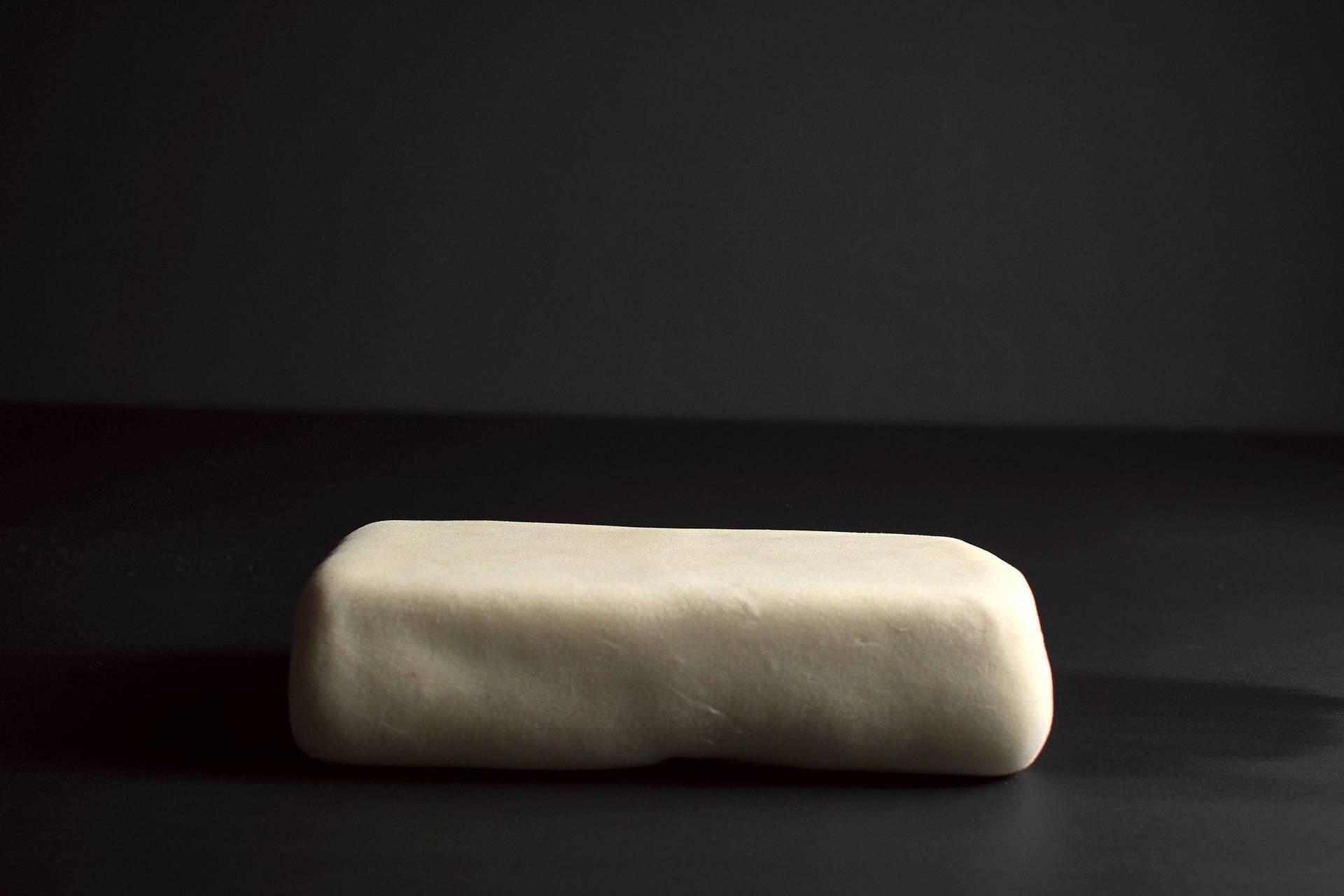 making puff pastry with black background