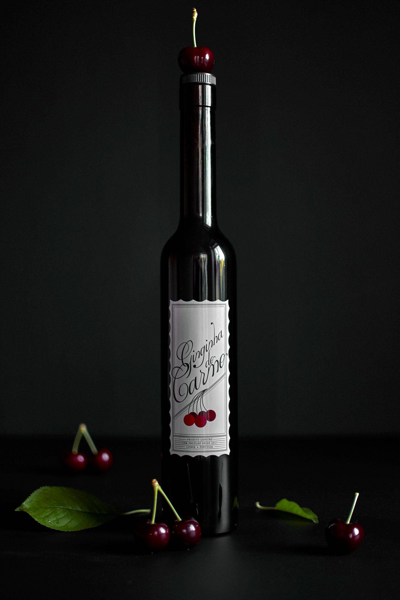portuguese ginja cherry liquor on black background