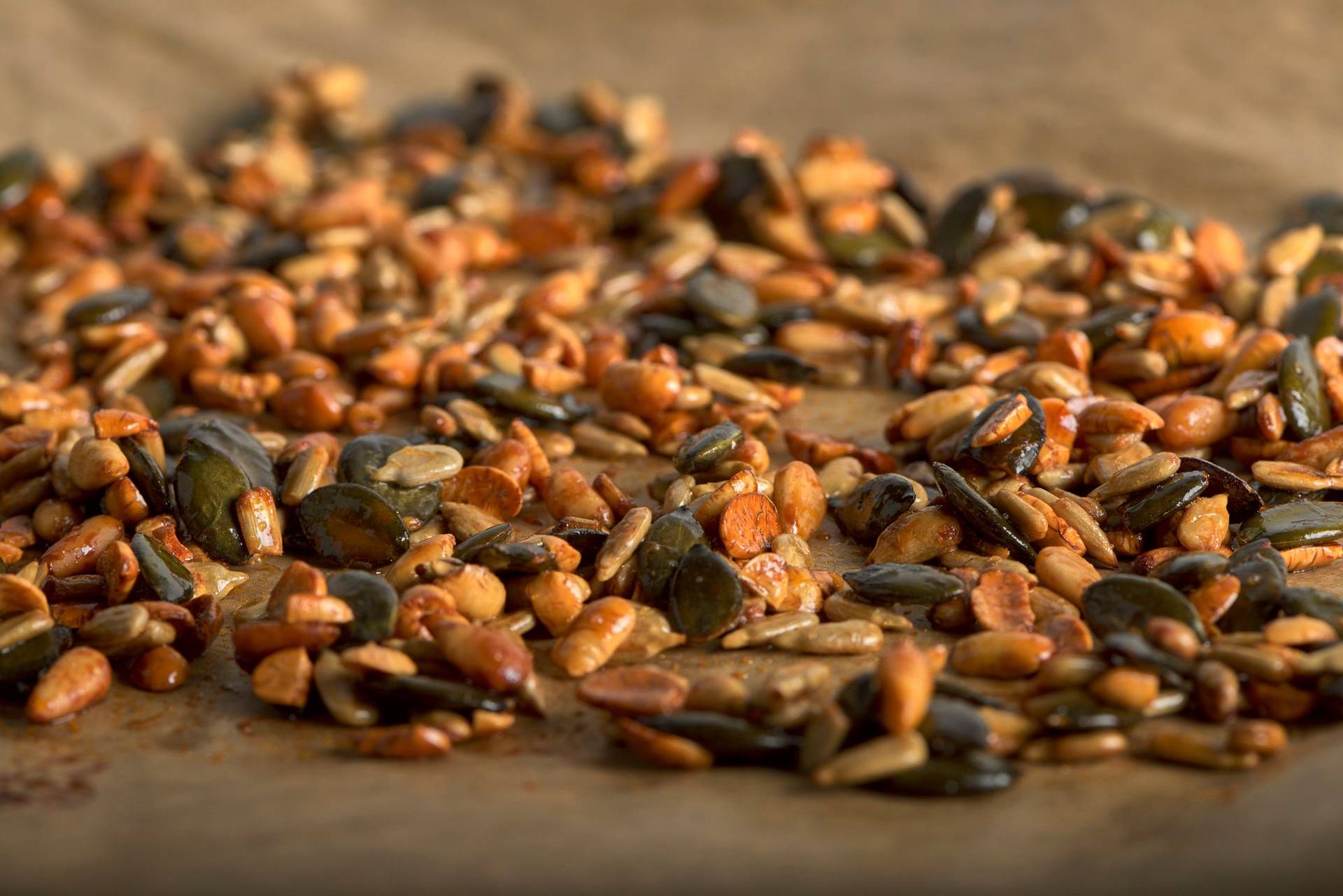 caramelized nuts on a baking sheet