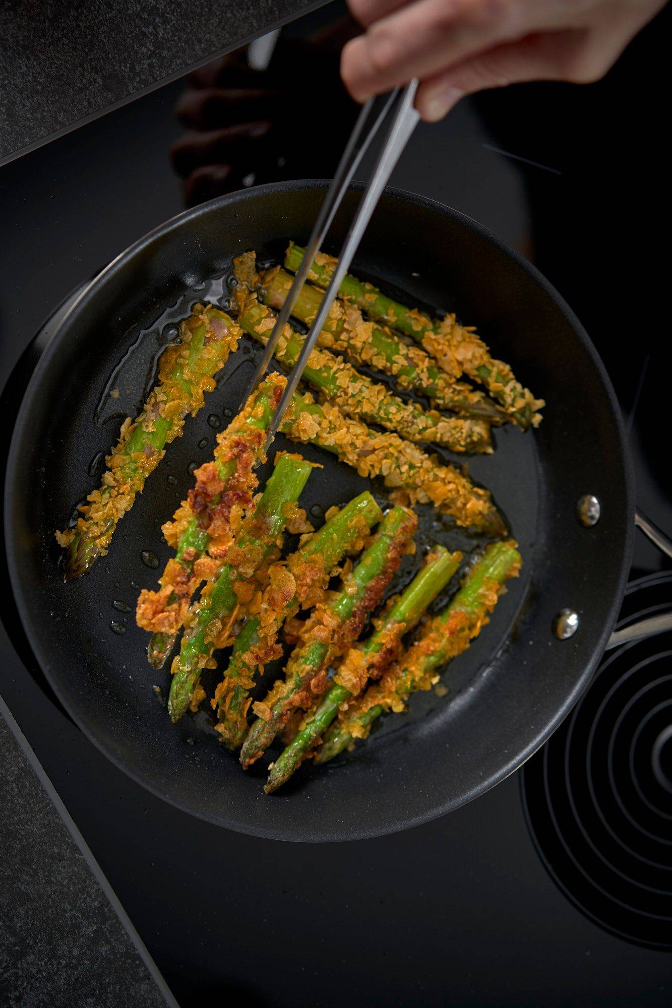 making asparagus katsu in home kitchen