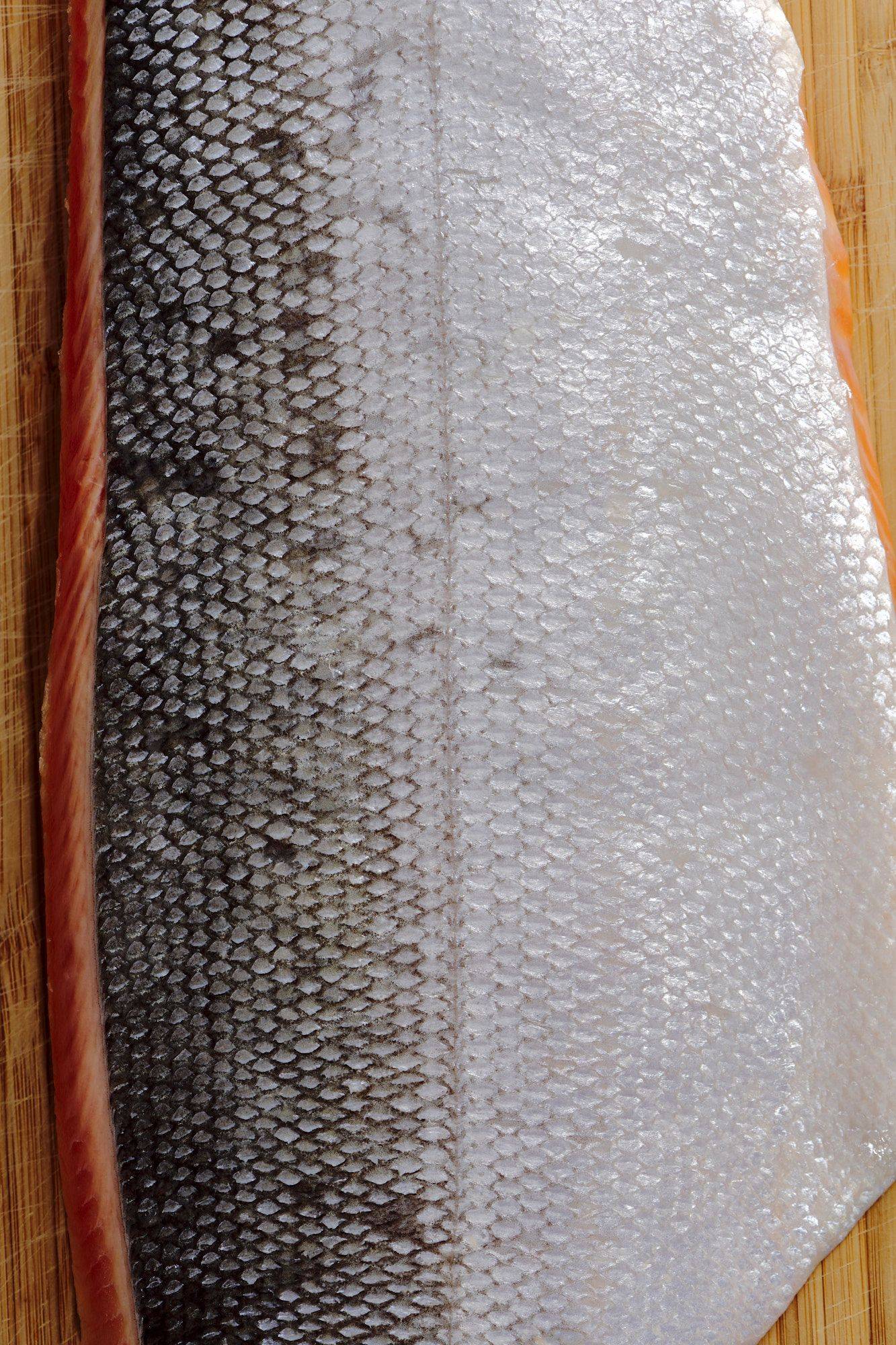 salmon fillet on a wooden board