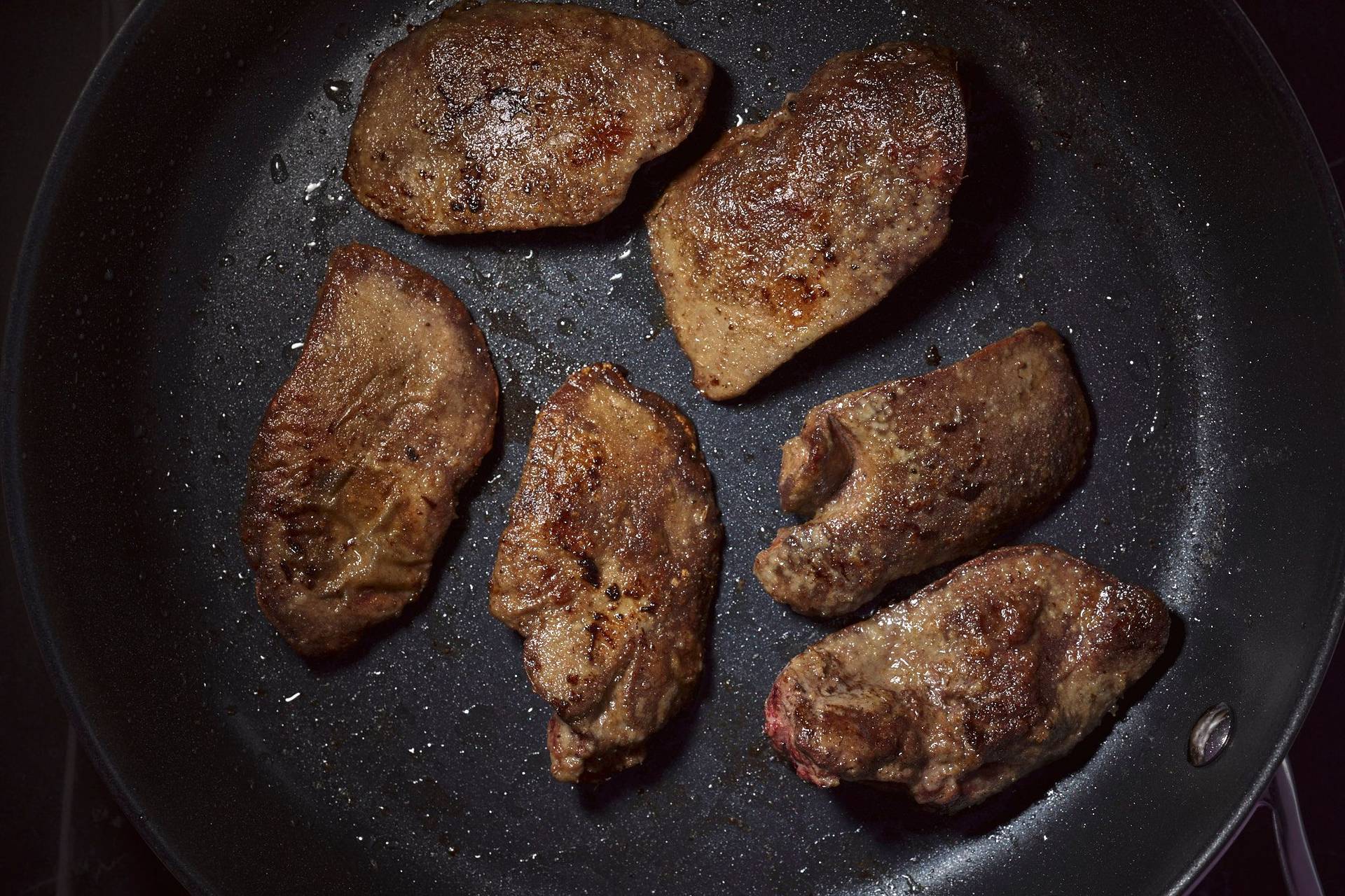 seared chicken liver in a pan