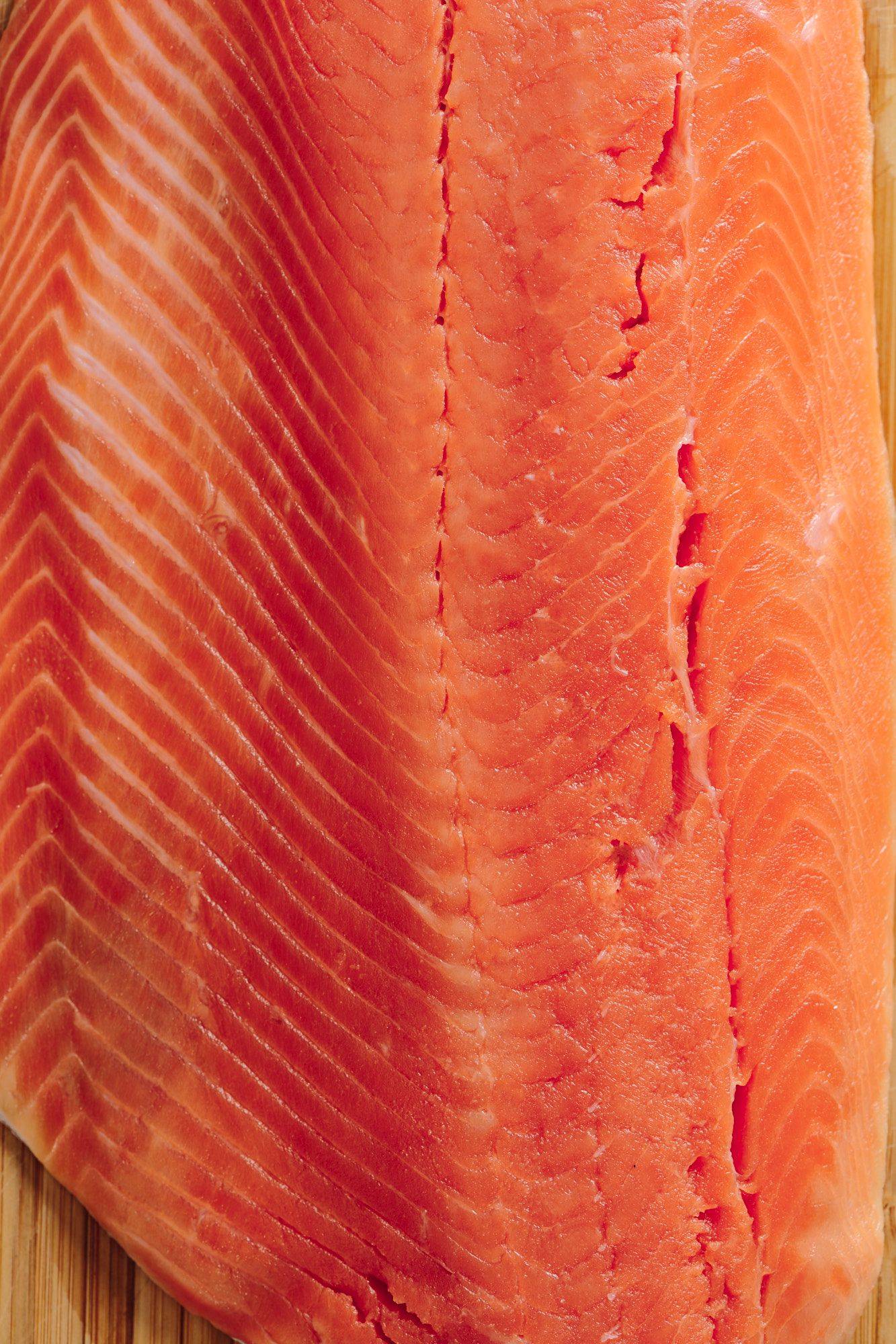 salmon fillet on a wooden board