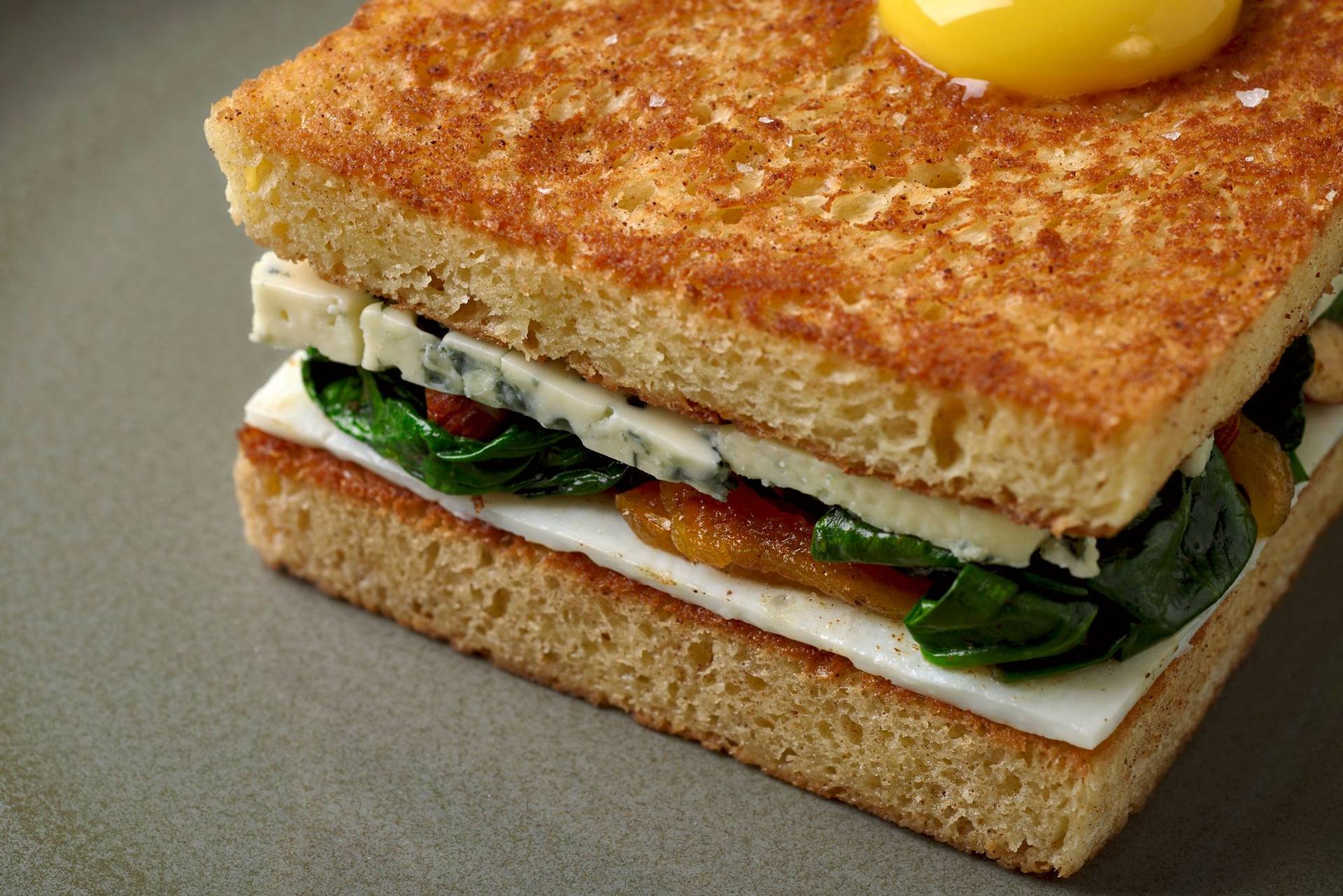 easter bread sandwich on a gray plate 