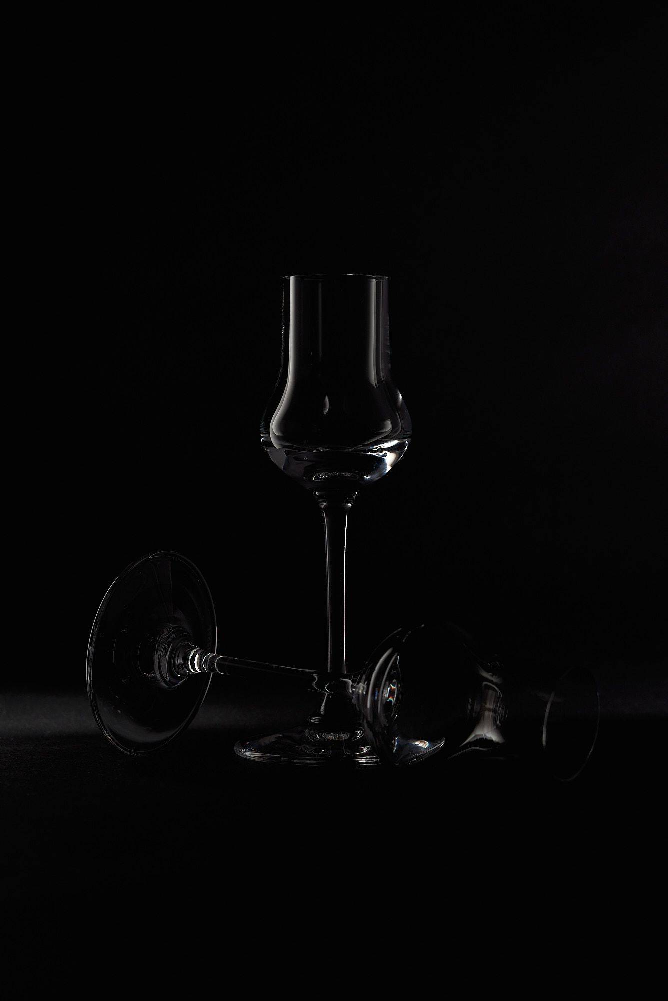 riedel veritas spirits and nosing glass on black background
