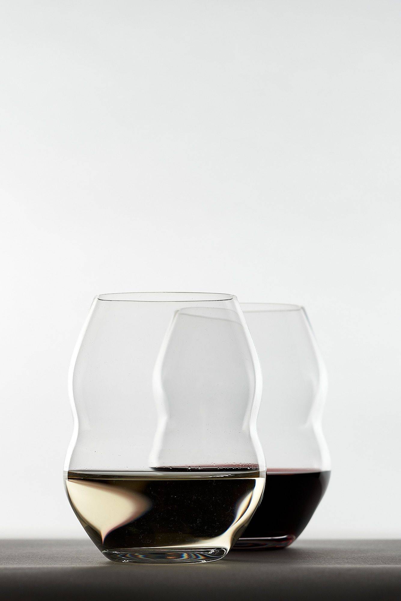 riedel veritas swirl glass on white background