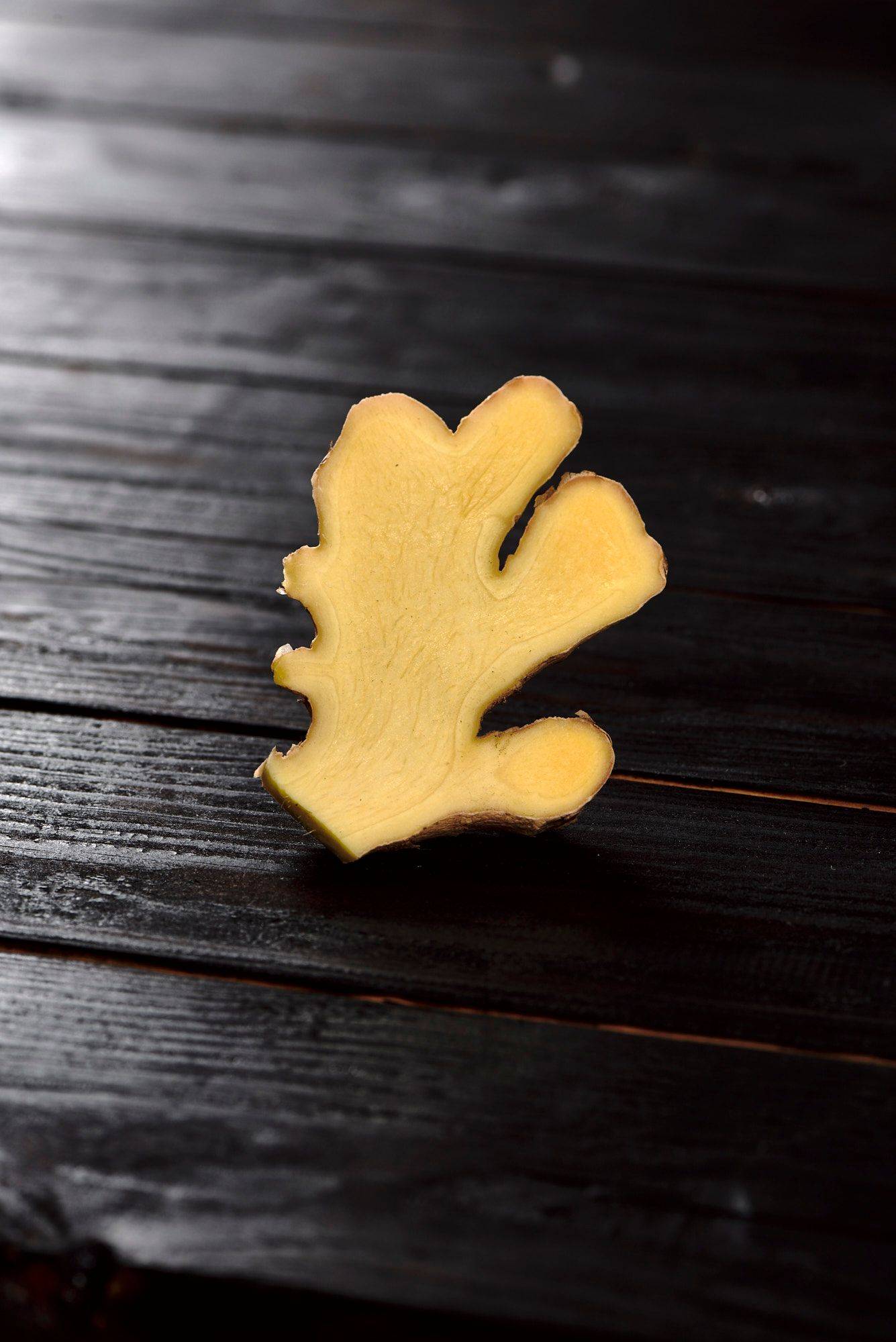 ginger ginger with black wooden background