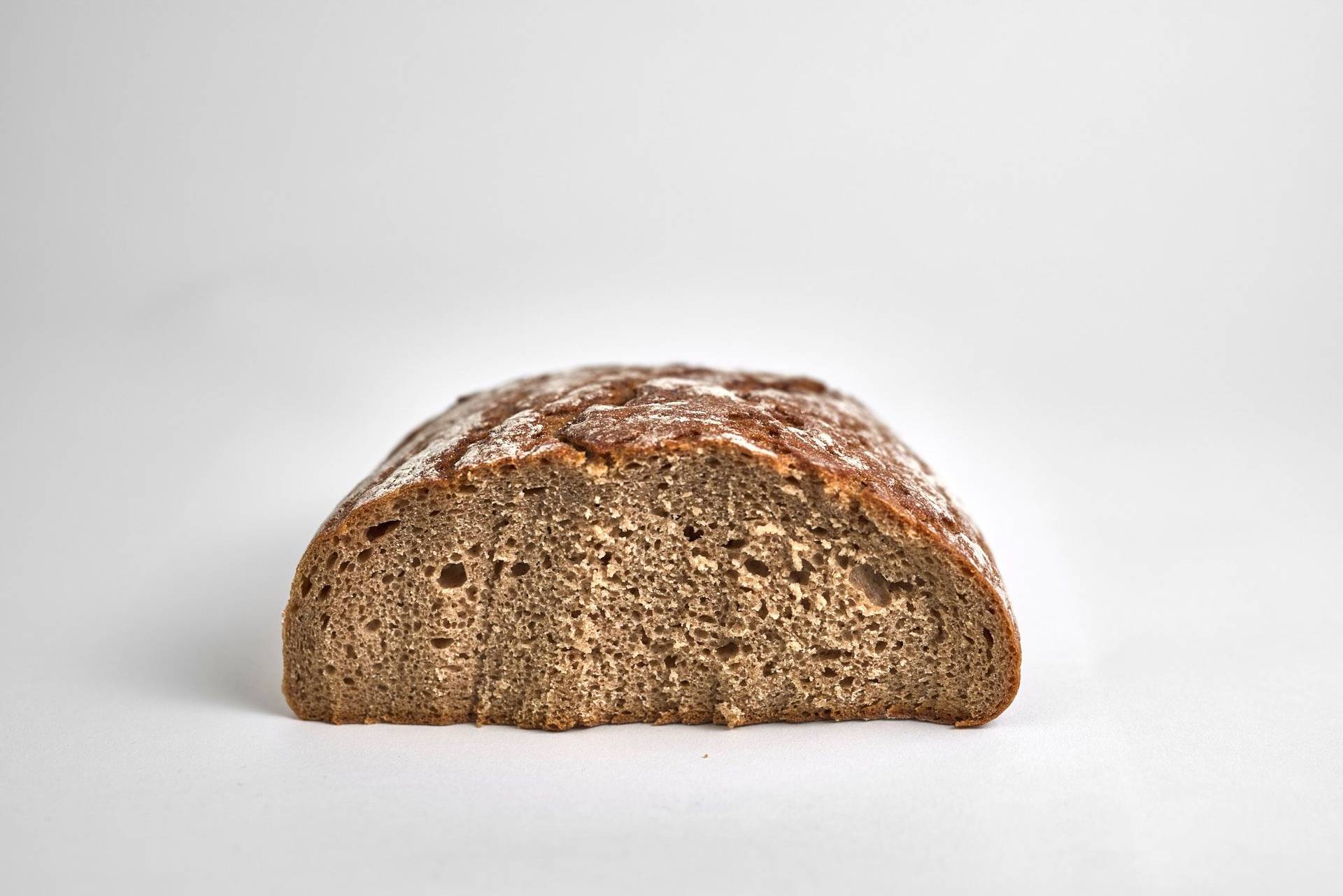 rye sourdough bread on white background
