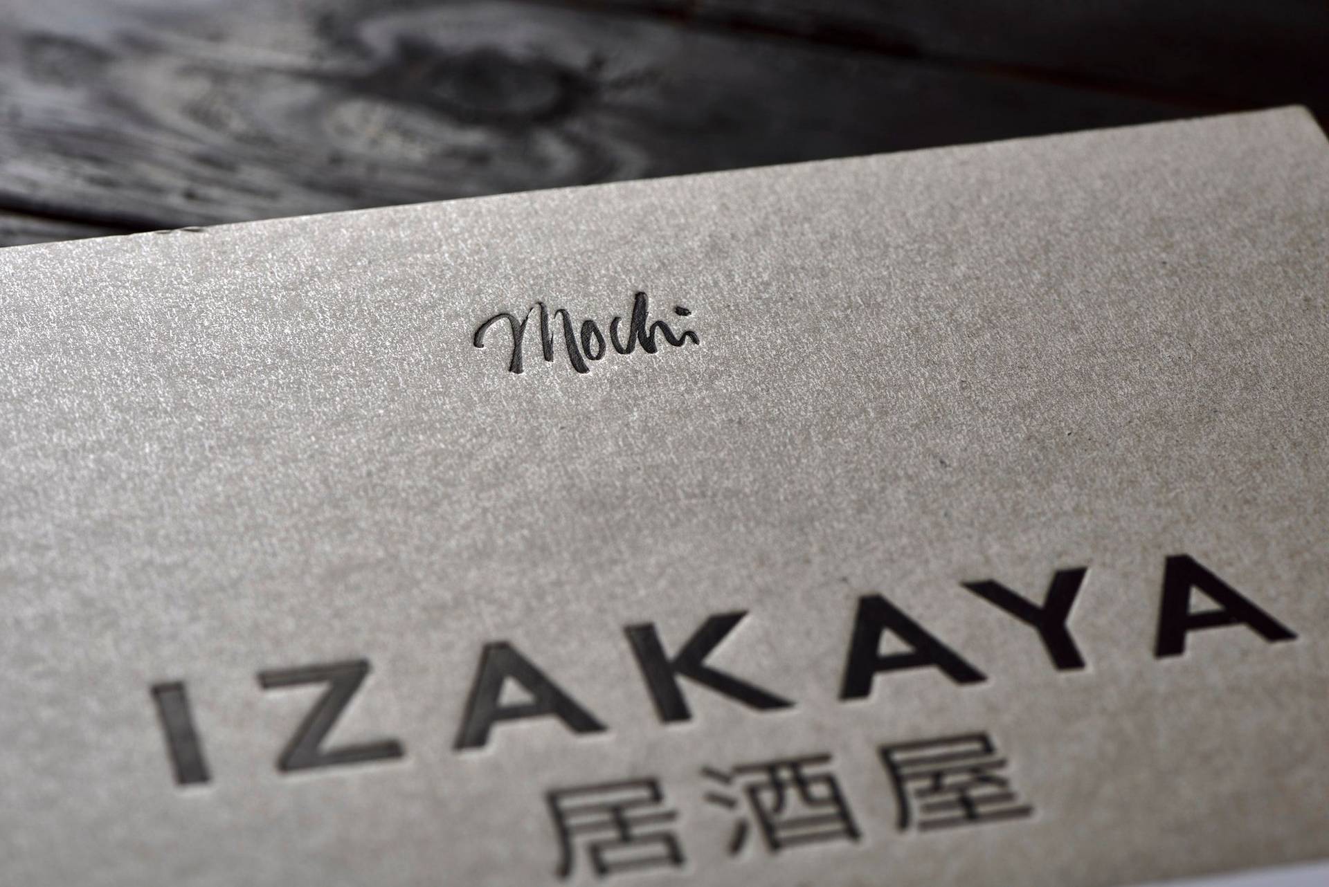izakaya cookbook with black wooden background