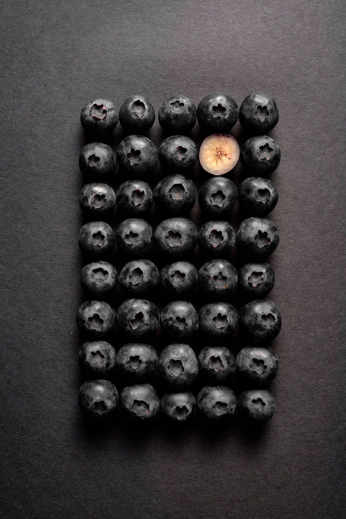 fresh blueberries on black background