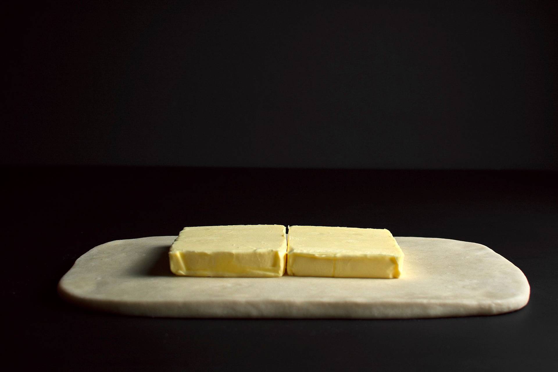 puff-pastry-making making puff pastry with black background