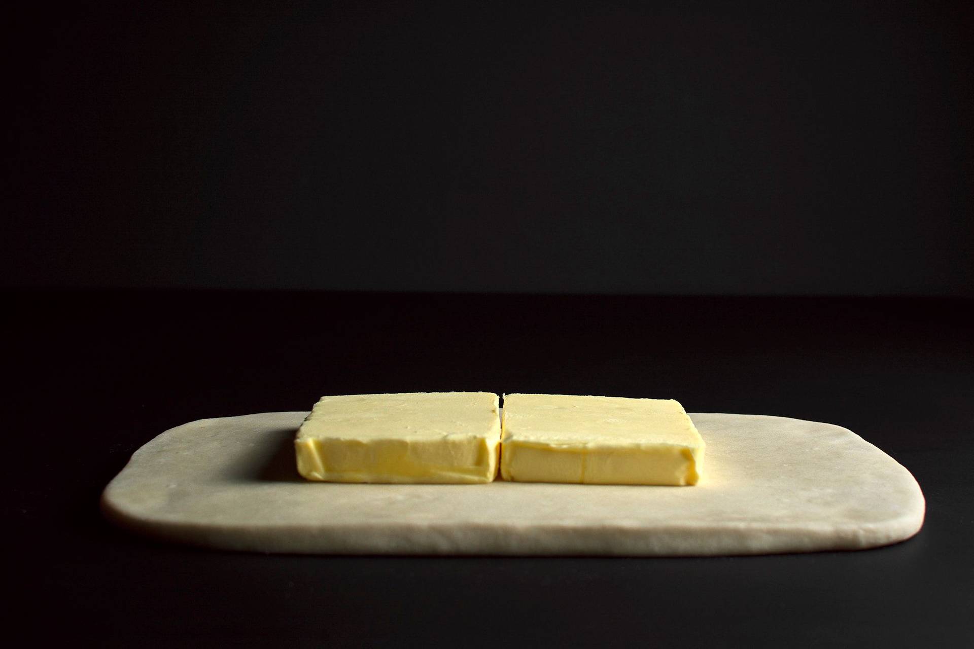 making puff pastry with black background