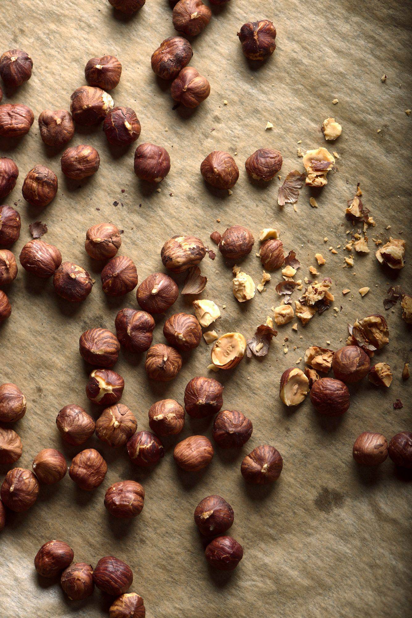 roasted hazelnuts on a baking sheet