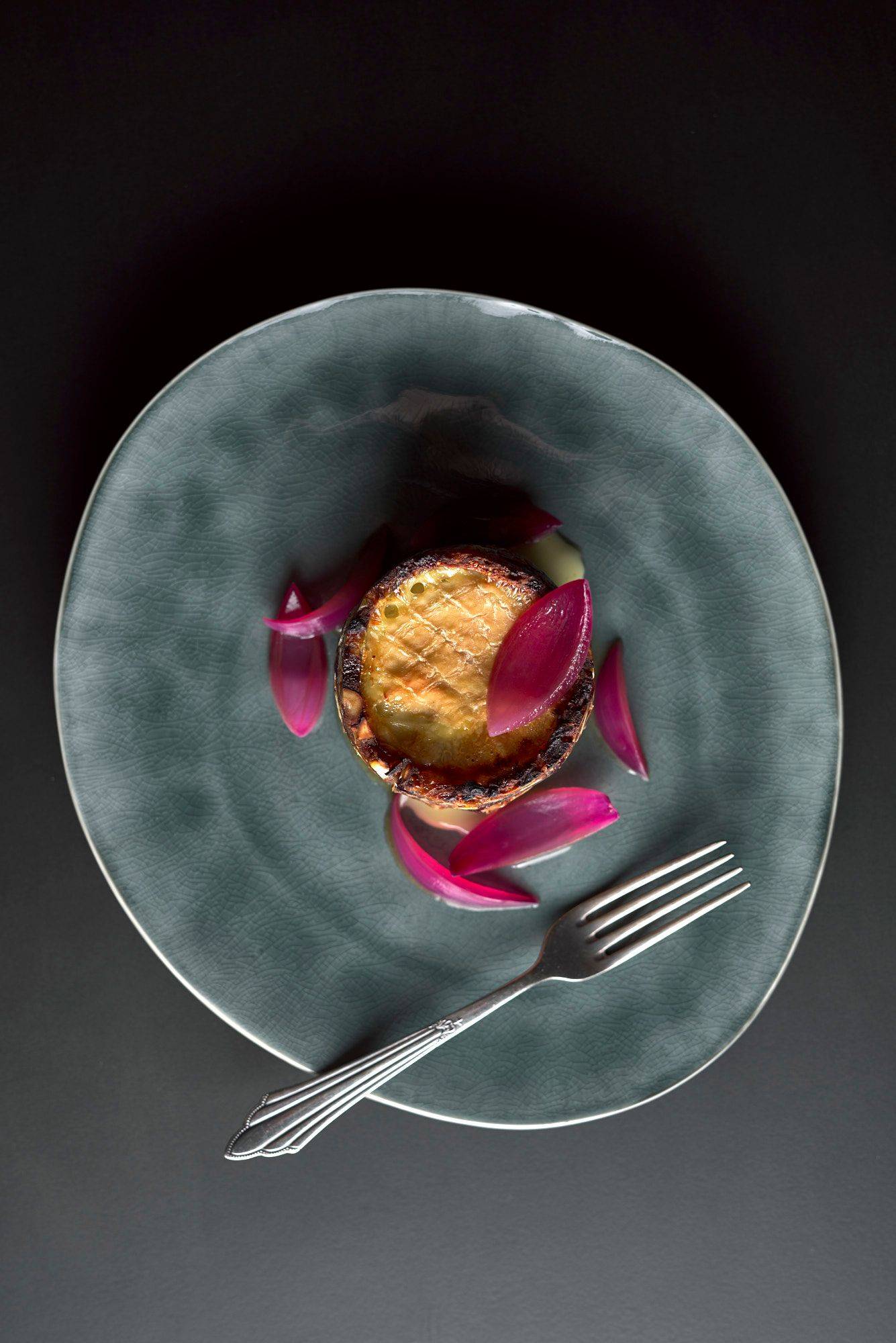 kale-cake-with-cheese-and-onion-pickles kale cake with cheese and onion pickles on black background
