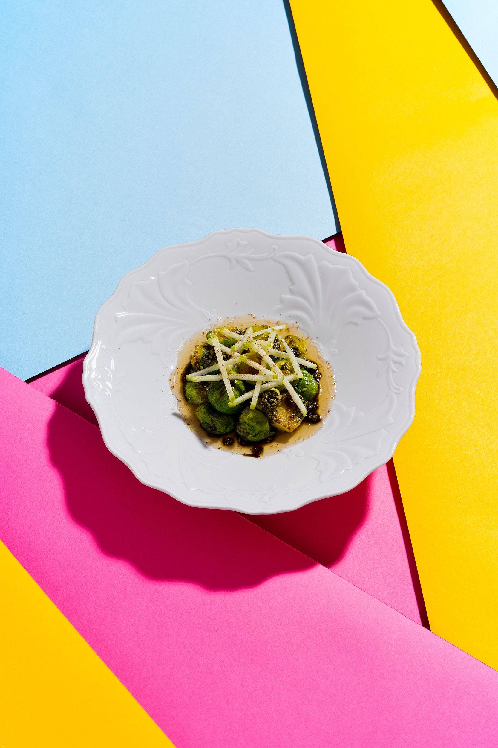 roasted-brussels-sprouts-with-verjus-pumpkin-seed-vinaigrette-green-apple-and-long-pepper roasted brussels sprouts with verjus-pumpkin seed vinaigrette green apple and long pepper on colorful underground
