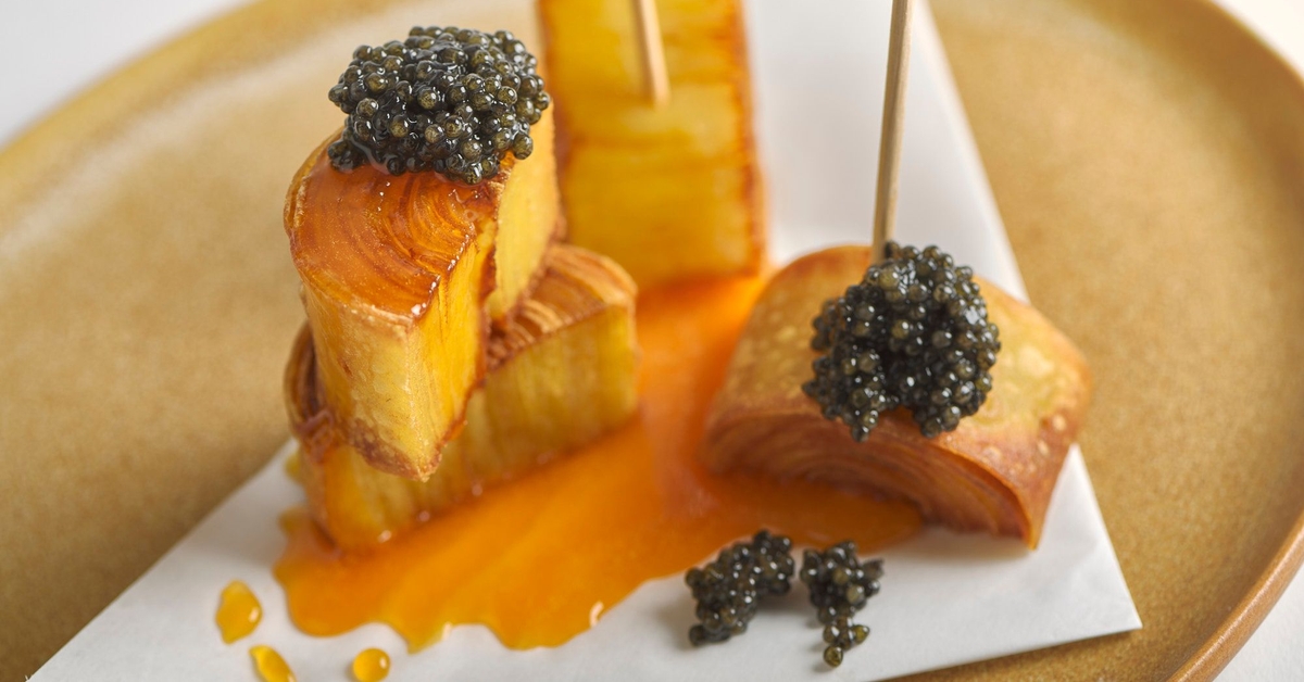 Crispy Potato Swirls with Egg Yolk & Caviar | Eatery Berlin