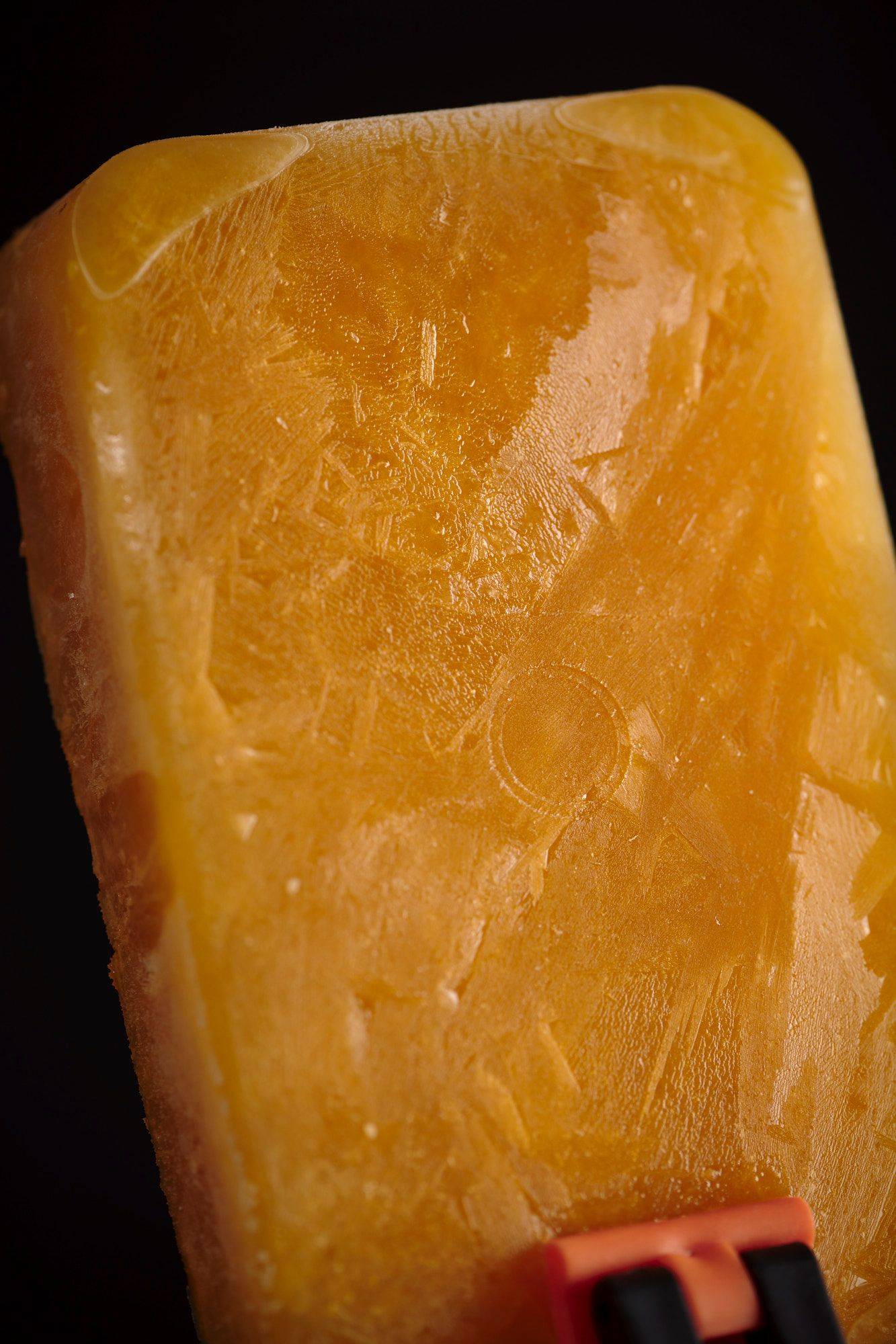 frozen tangerine granita with black background