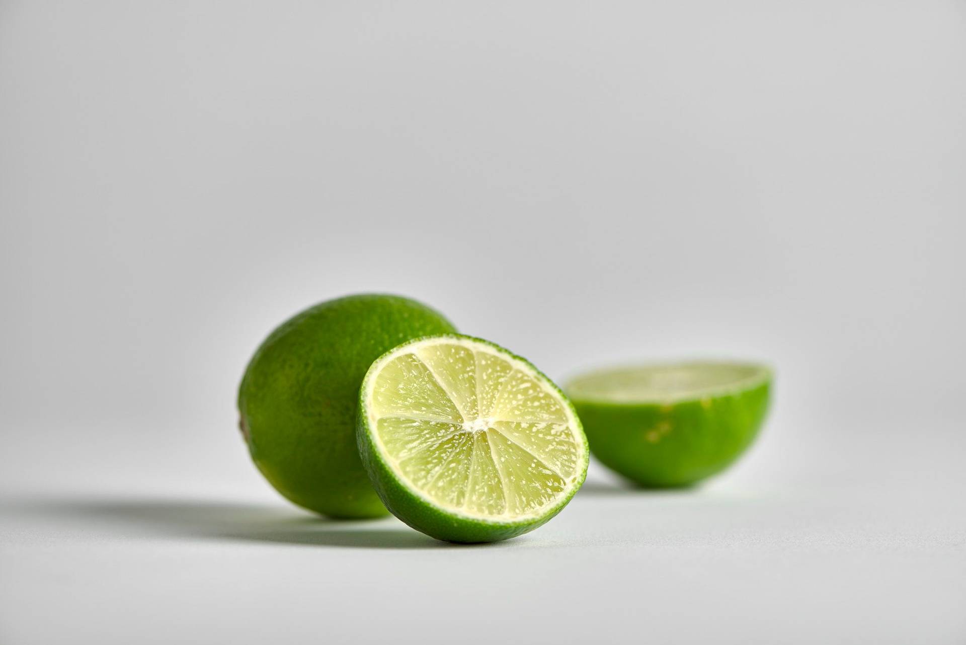 two limes with white background