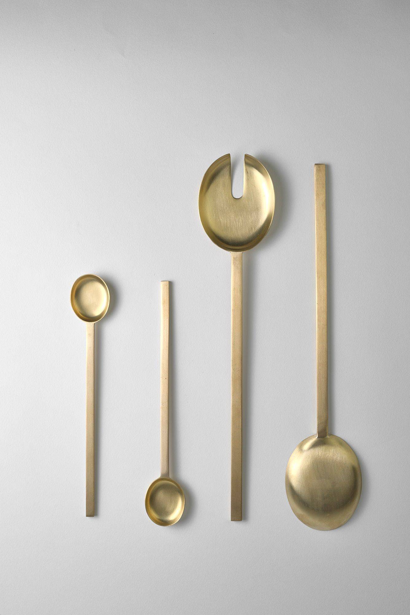 brass spoons by danish ferm living on white background