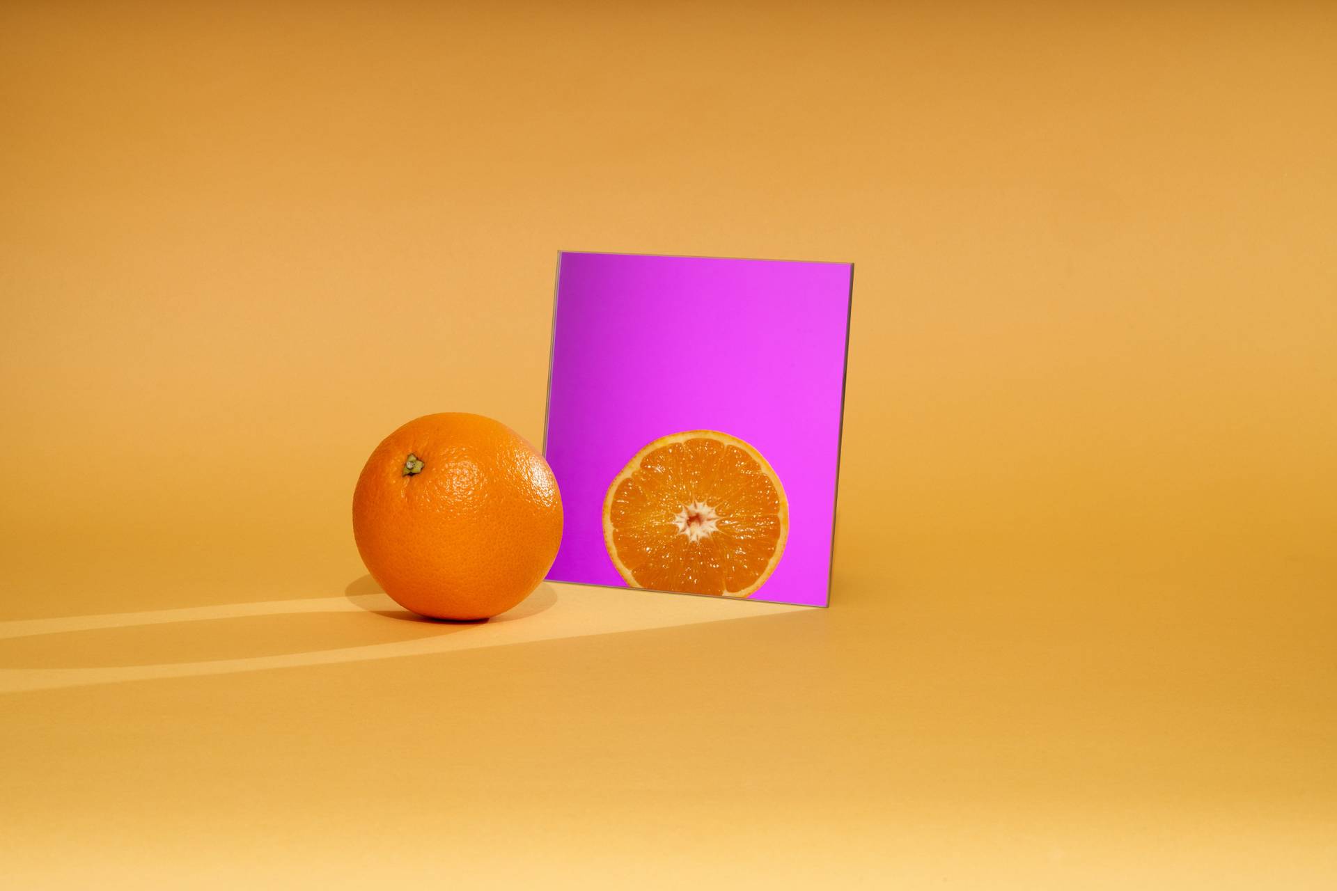 orange with purple mirror on yellow background