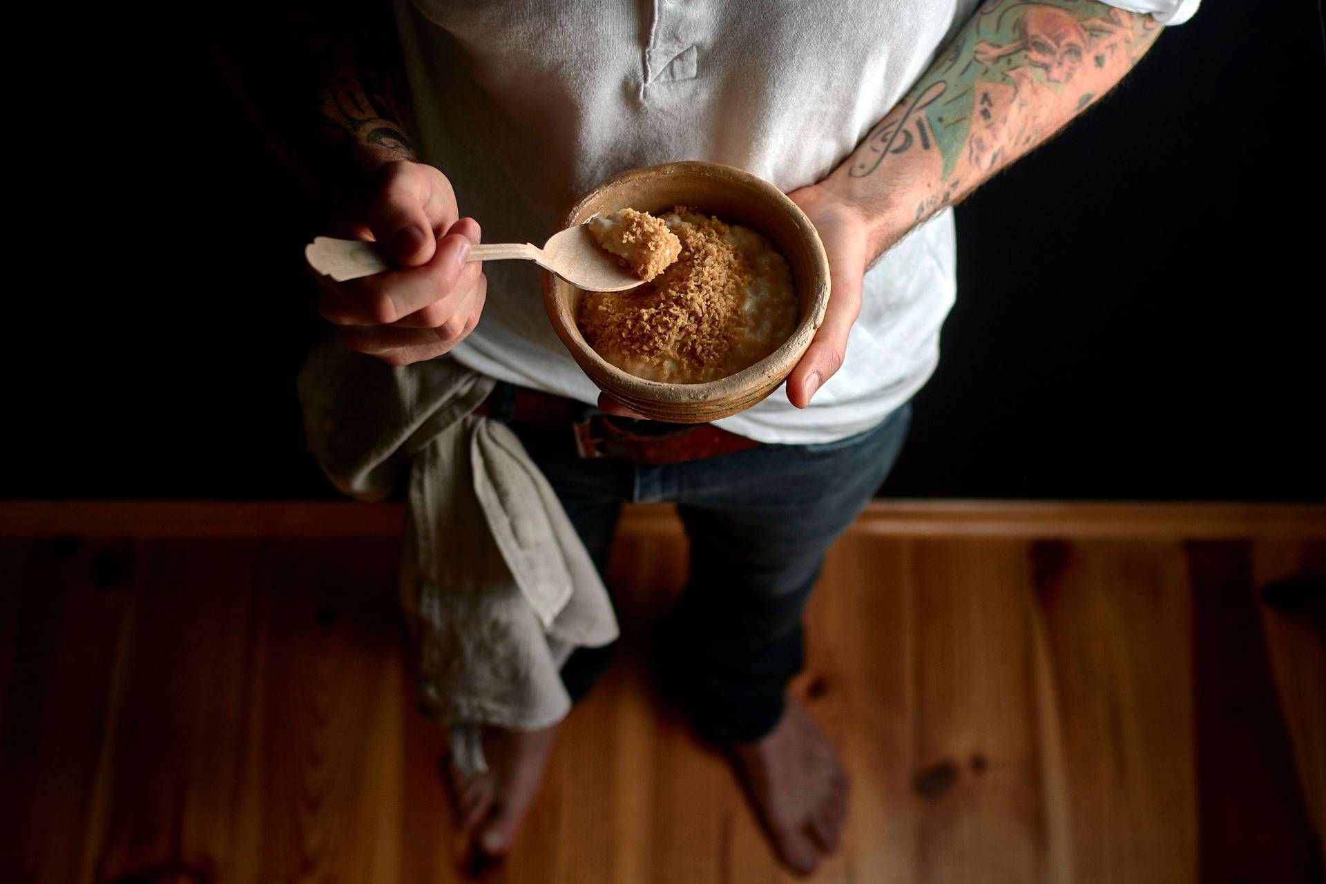 rice pudding with shortbread snow on black background